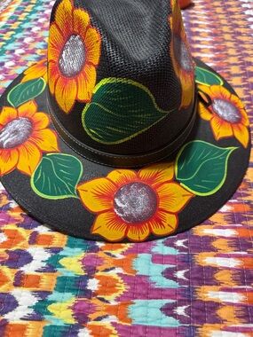 Straw hat with sunflowers